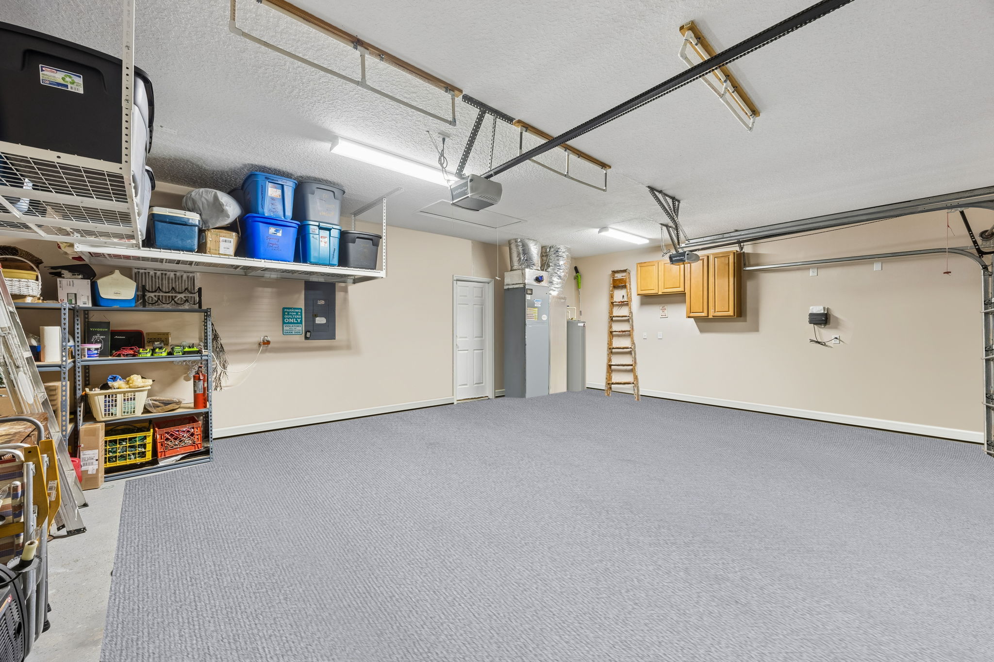 A 3 car garage for cars, golf cart and ample storage.