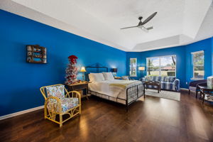 Spacious primary bedroom filled with