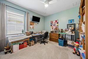 Third bedroom currently being used as craft room.