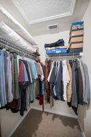 Upper Level Primary Bedroom Walk-in Closet1b