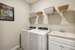 Even the laundry room is pretty, upgraded with a laundry sink. Washer and dryer INCLUDED!