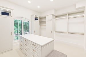 One of 3 Primary Walk In Closets