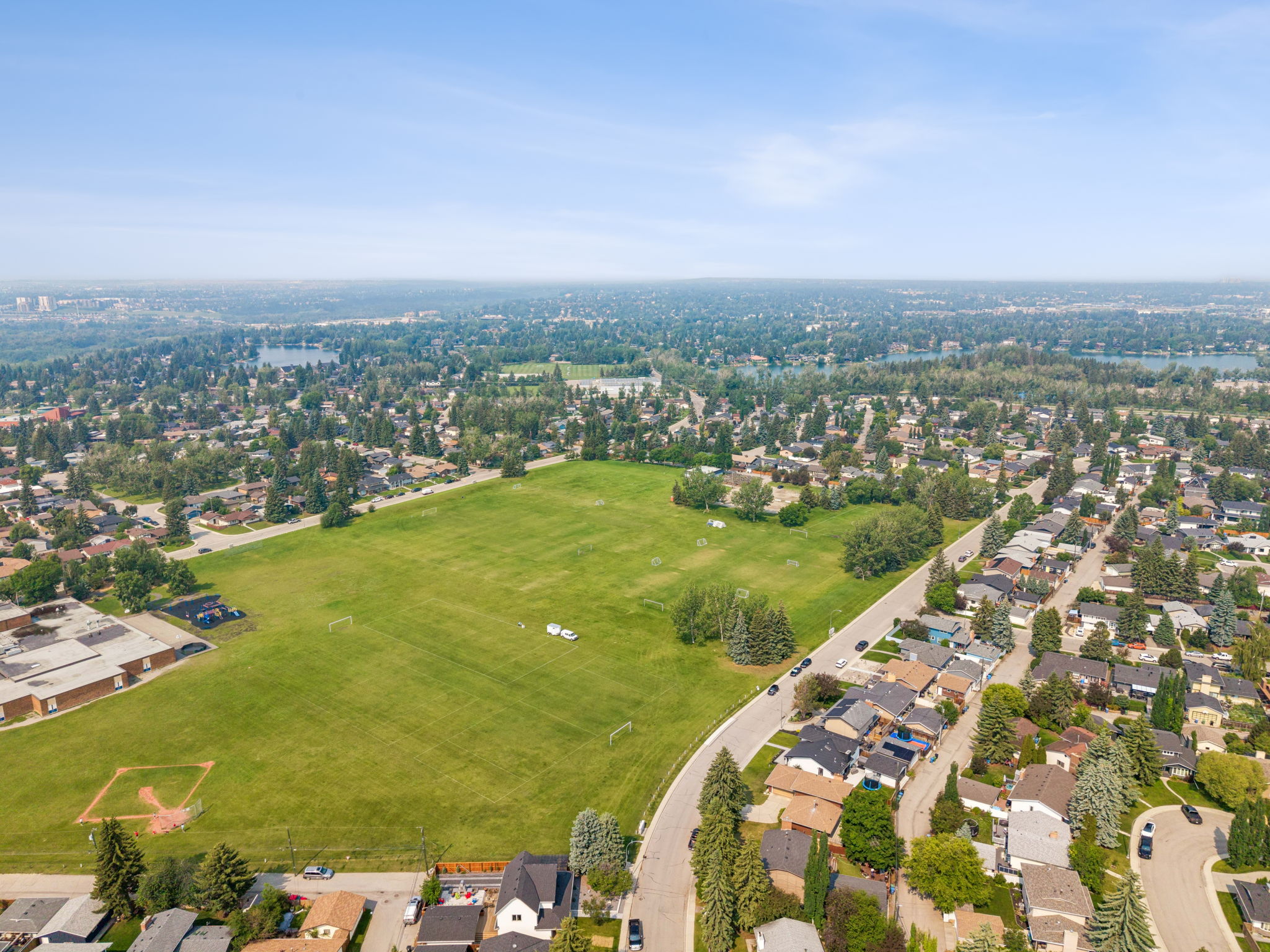 06.30.2026 - Morris Tkachuk - 856 Lake Twintree Crescent SE - Drone_06