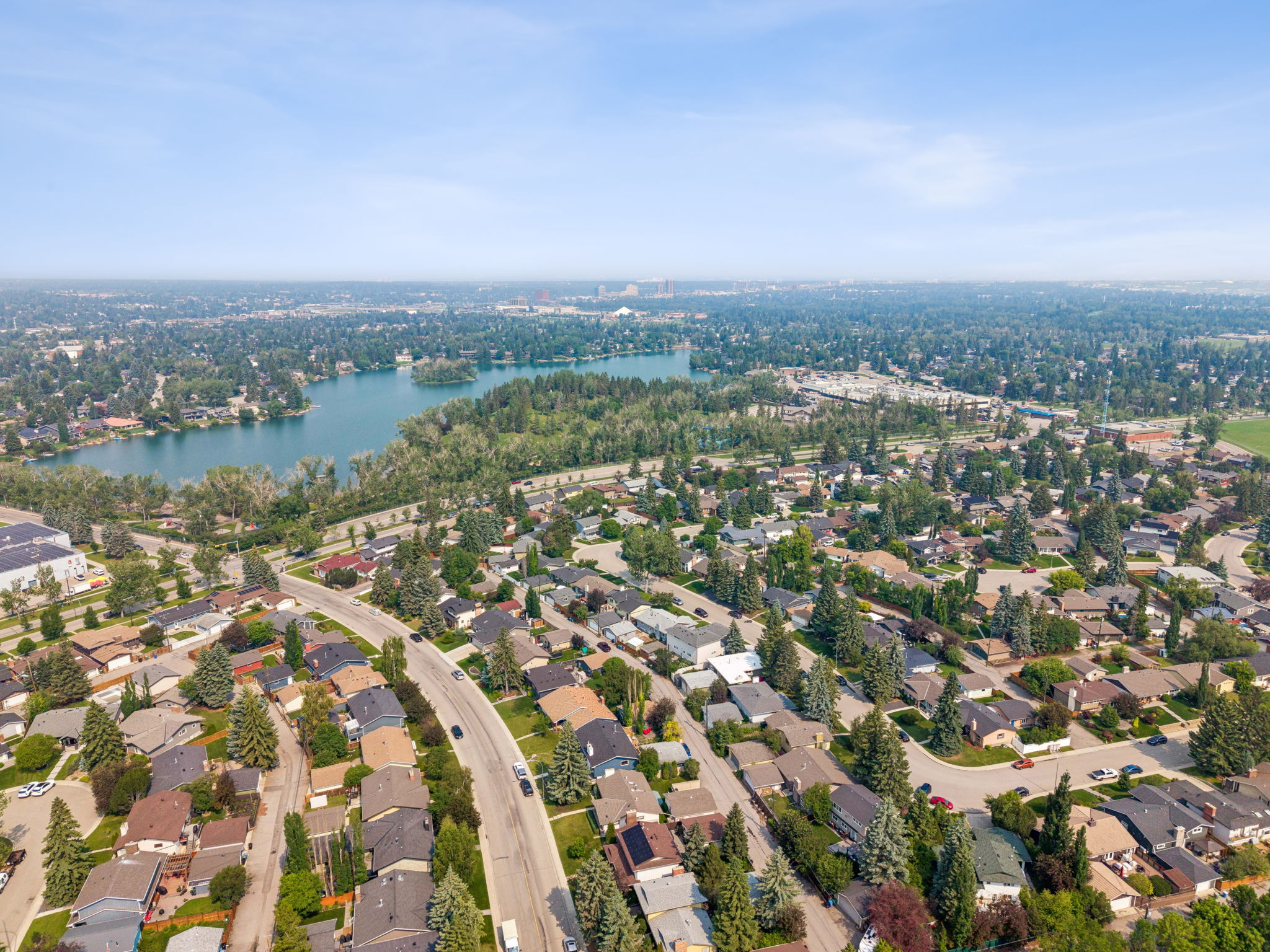 06.30.2026 - Morris Tkachuk - 856 Lake Twintree Crescent SE - Drone_07