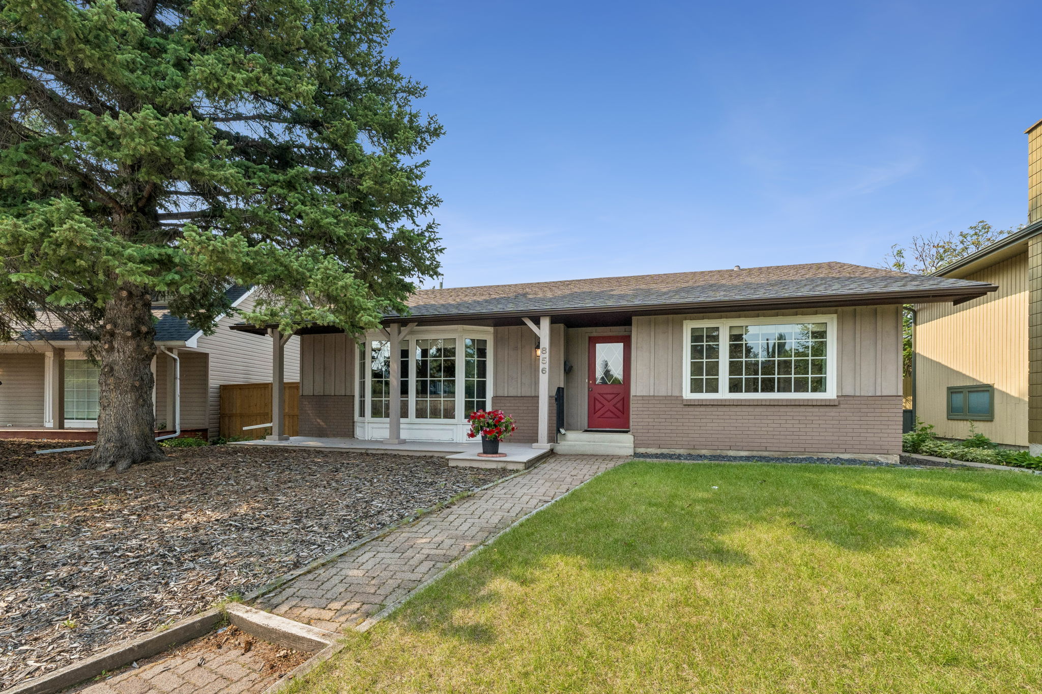 06.30.2026 - Morris Tkachuk - 856 Lake Twintree Crescent SE_04