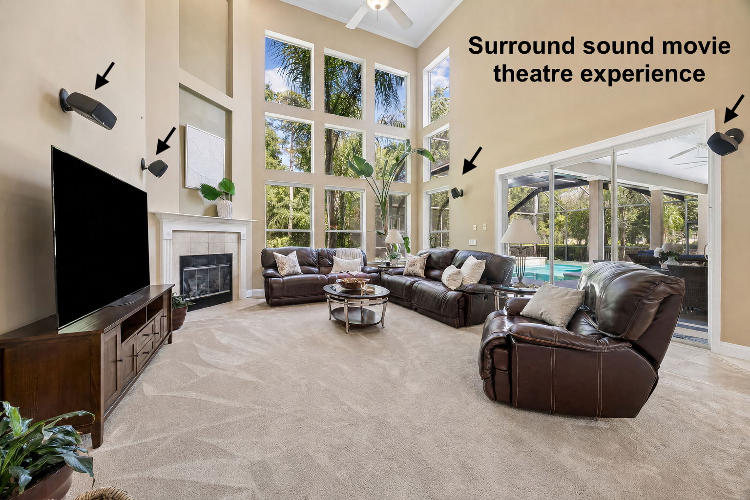 Beyond, the main gathering room opens dramatically with surround sound, a fireplace, and soaring scale…