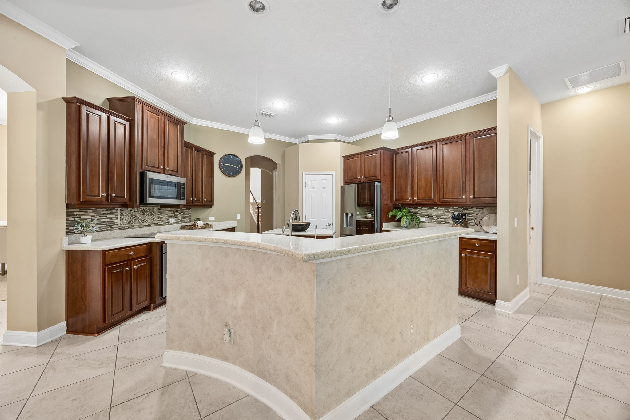 Designed for connection, the kitchen offers an easy flow for cooking, serving, gathering, and conversation…