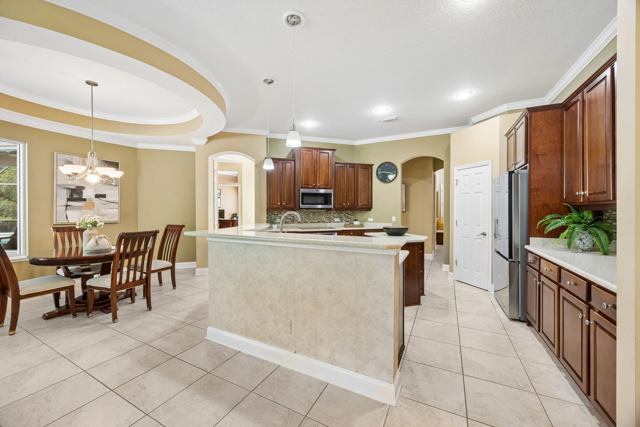 The kitchen and breakfast area come together with an open, easy layout for casual meals and relaxed gathering…