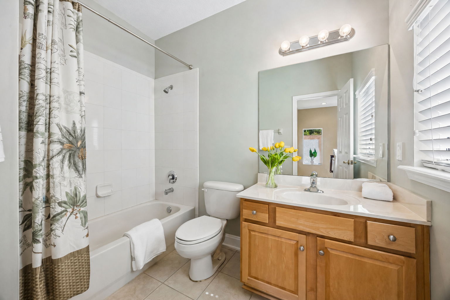 … with a full tub-shower, vanity, and natural light to support the second-floor living area.