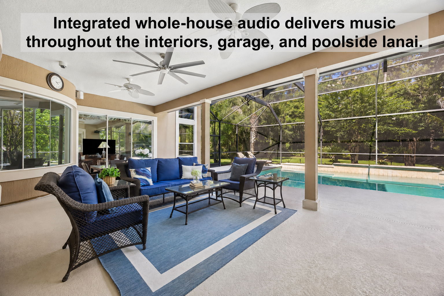 … with whole-house audio carrying music through the interiors, garage, and poolside lanai.