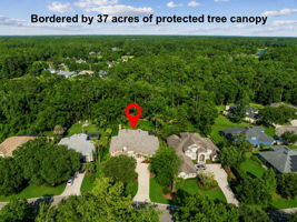 ... privately bordered by 37 acres of protected tree canopy