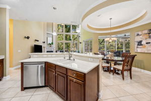 ... with a curved architectural ceiling detail that gives the everyday dining space a sense of occasion