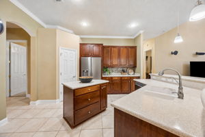 ... with abundant cabinetry and a spacious wraparound layout that keeps everything within reach