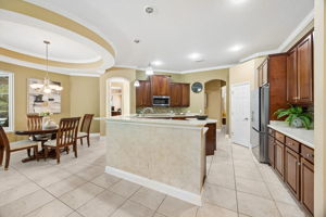 The kitchen and breakfast area come together with an open, easy layout for casual meals and relaxed gathering…