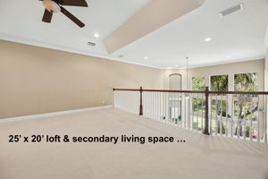 Upstairs, a 25' x 20' loft creates an impressive secondary living space with room for media, games, or lounging ...