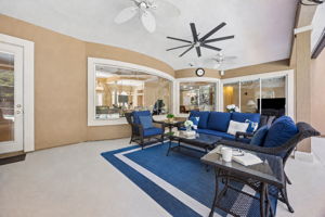 … framed by wide windows that keep the home visually tied to the pool and outdoor gathering areas