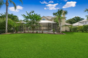 … with the rear of the home opening beautifully to the screened outdoor living area.
