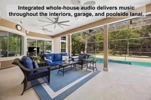 … with whole-house audio carrying music through the interiors, garage, and poolside lanai.