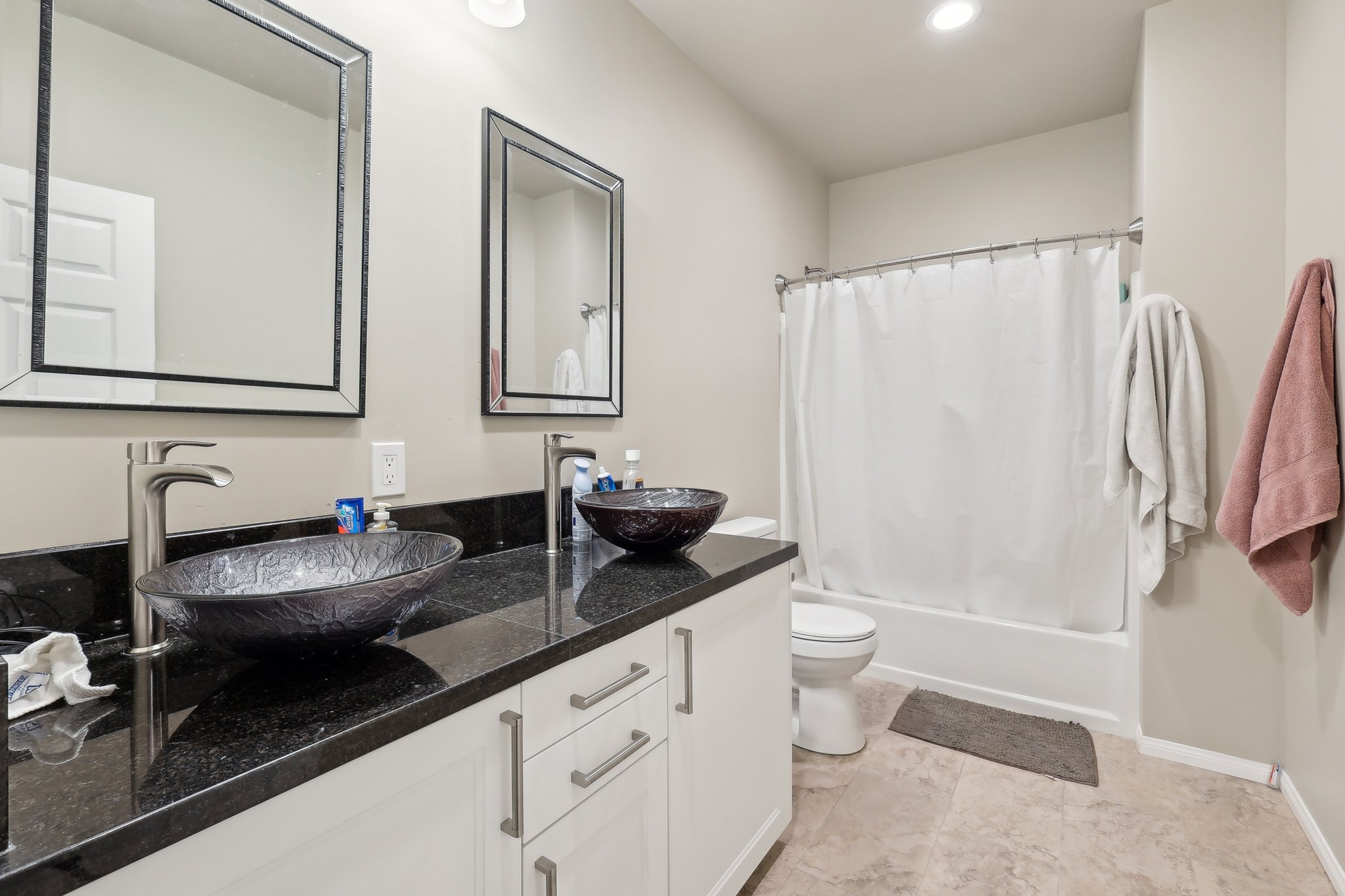 One of Two Upstairs Hall Bathrooms
