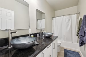 One of Two Upstairs Hall Bathrooms