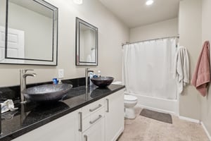 One of Two Upstairs Hall Bathrooms