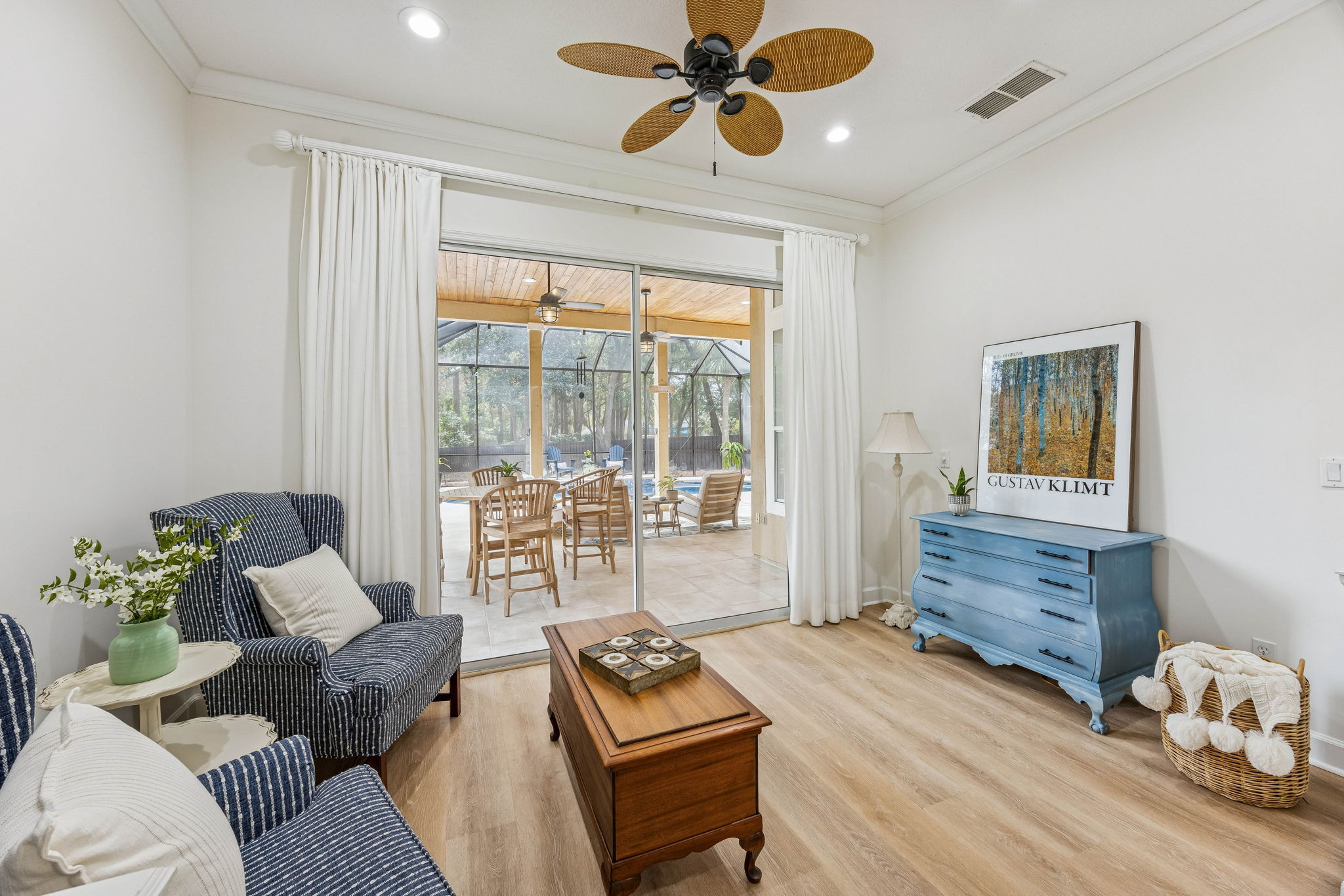 ... it offers peaceful views of the pool and private backyard beyond