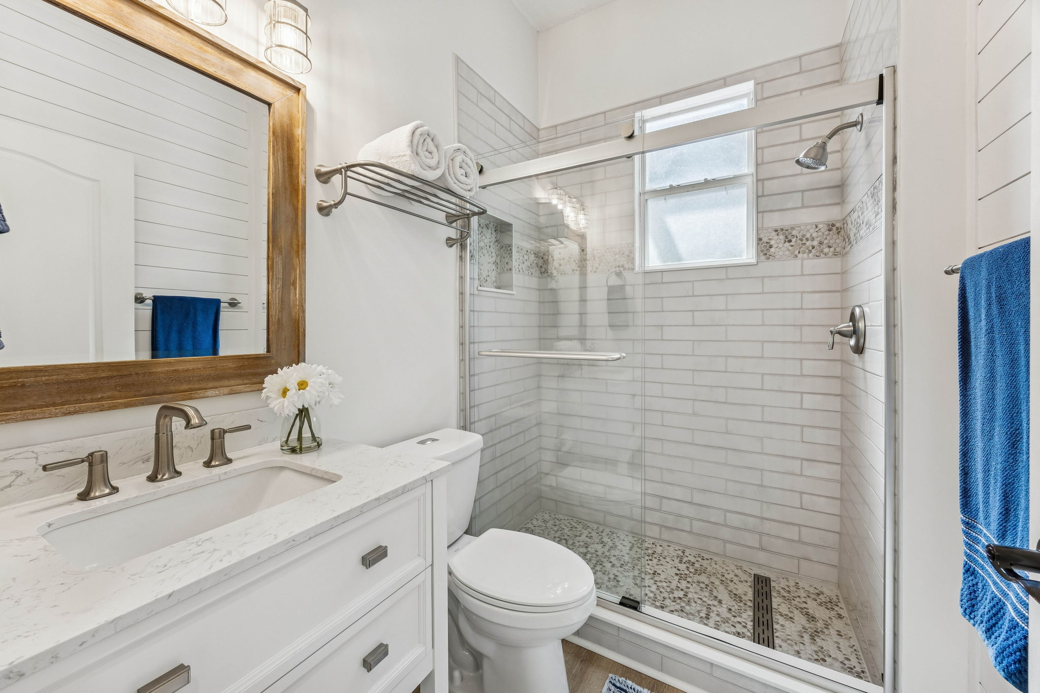 Each guest bedroom has a newly renovated bath immediately adjacent