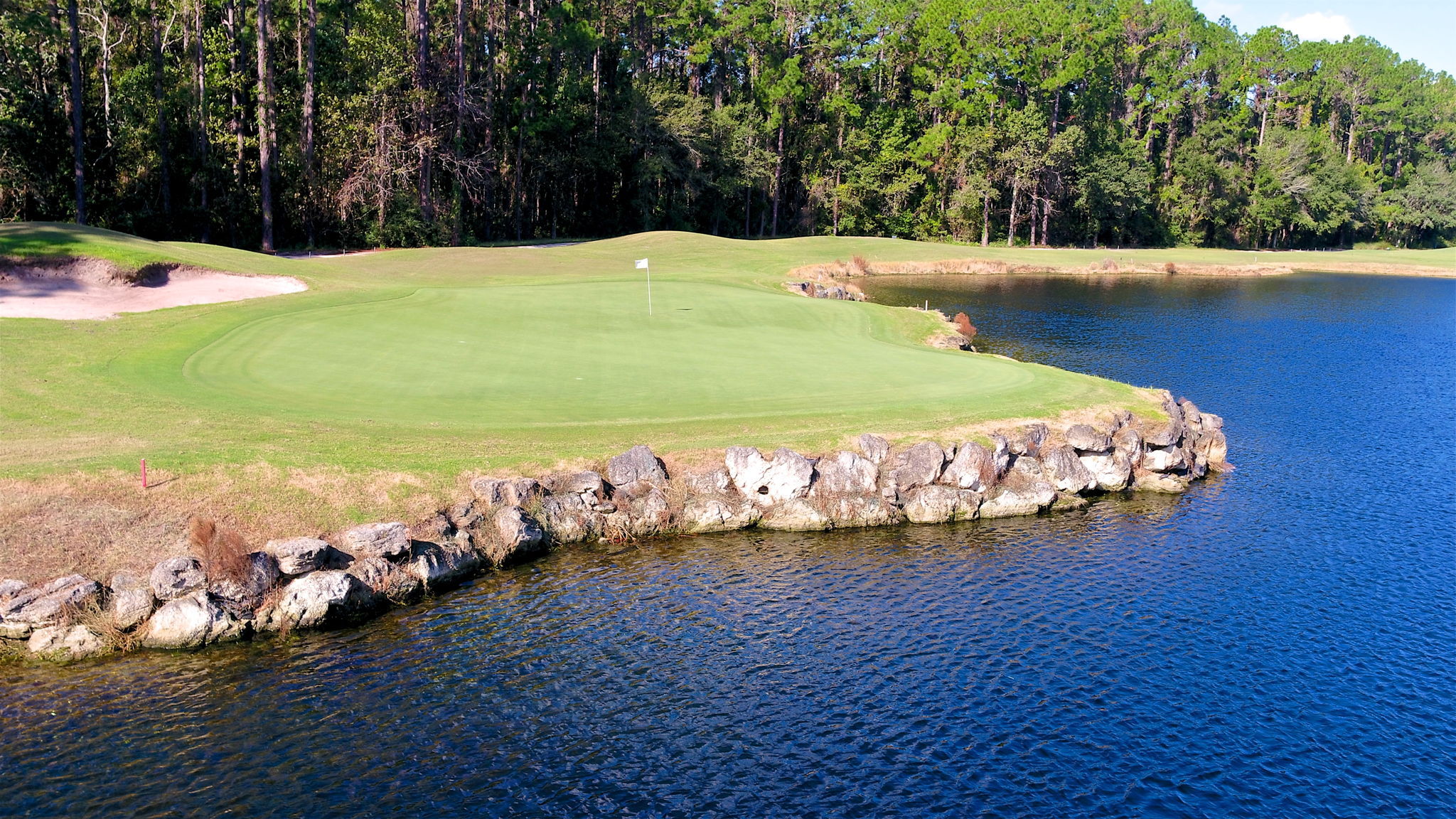 ... designed by Arnold Palmer, it is a championship 7080 yard course, par 72 layout