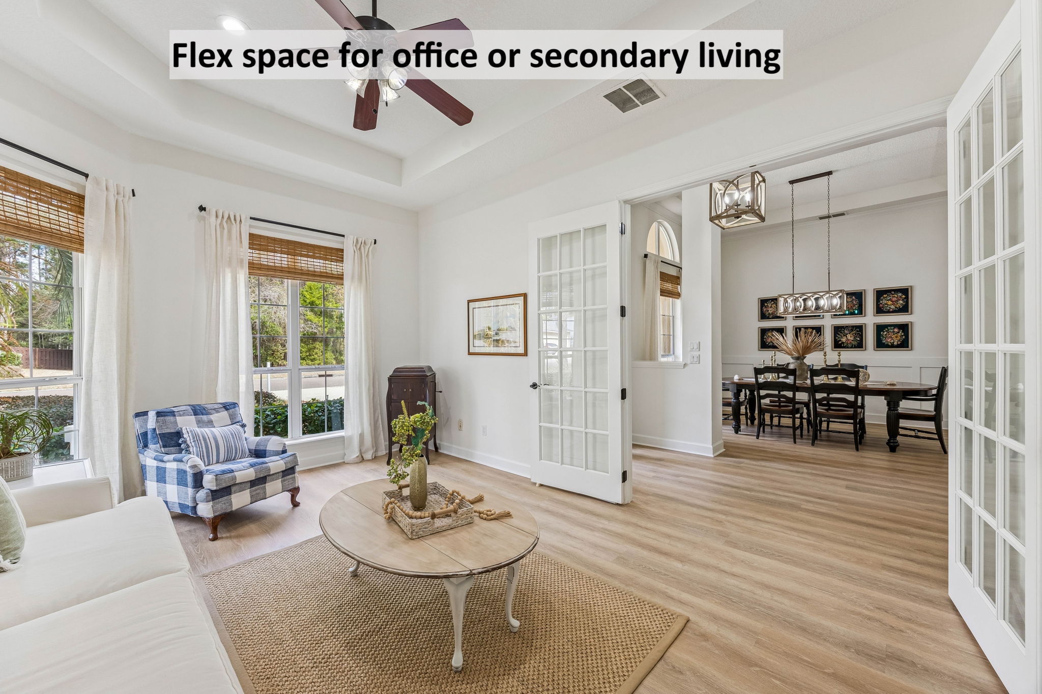 Just inside, is a French-doored flex room ...