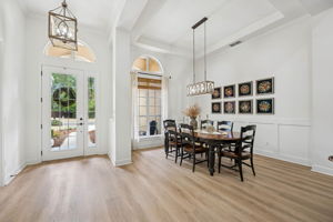 ... with tray ceilings, picture-frame wainscoting