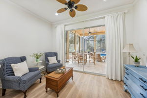 Encompassing both a spacious bedroom and a separate sitting area ...