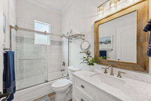 Each guest bath is elegantly appointed with contemporary finishes and upscale detail