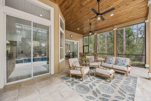 The expansive screened pool area is designed for true Florida living ...