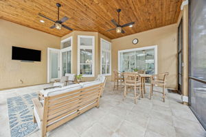 ... crown a generous covered lounge and dining area