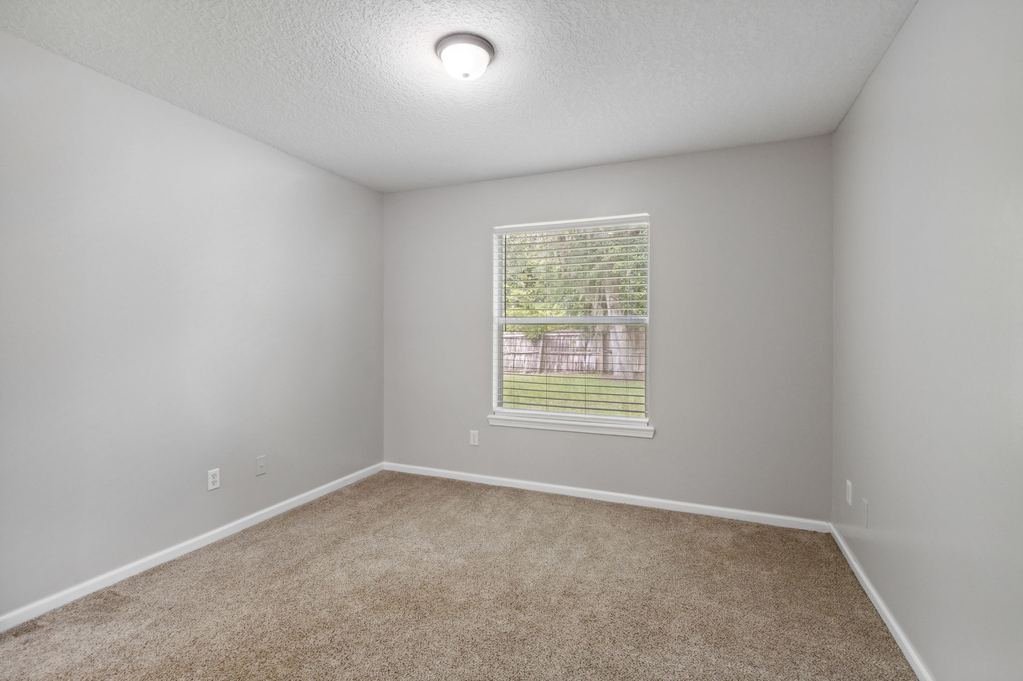 Both guest bedrooms were freshly painted with a coordinating soft, neutral color