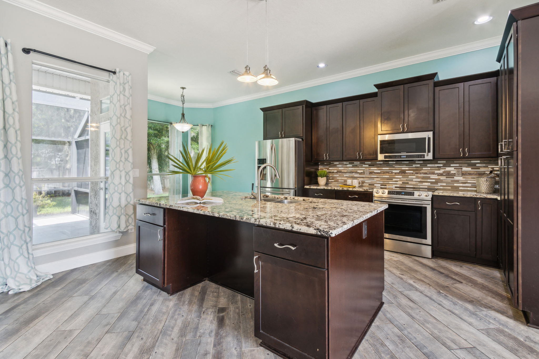 ... ample counter space, accented with a contemporary, stylish granite ...