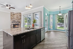 The kitchen layout allows for views of family room, dining and back yard.