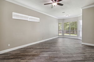 Step into the spacious master suite adorned with a calming and neutral color palette ...