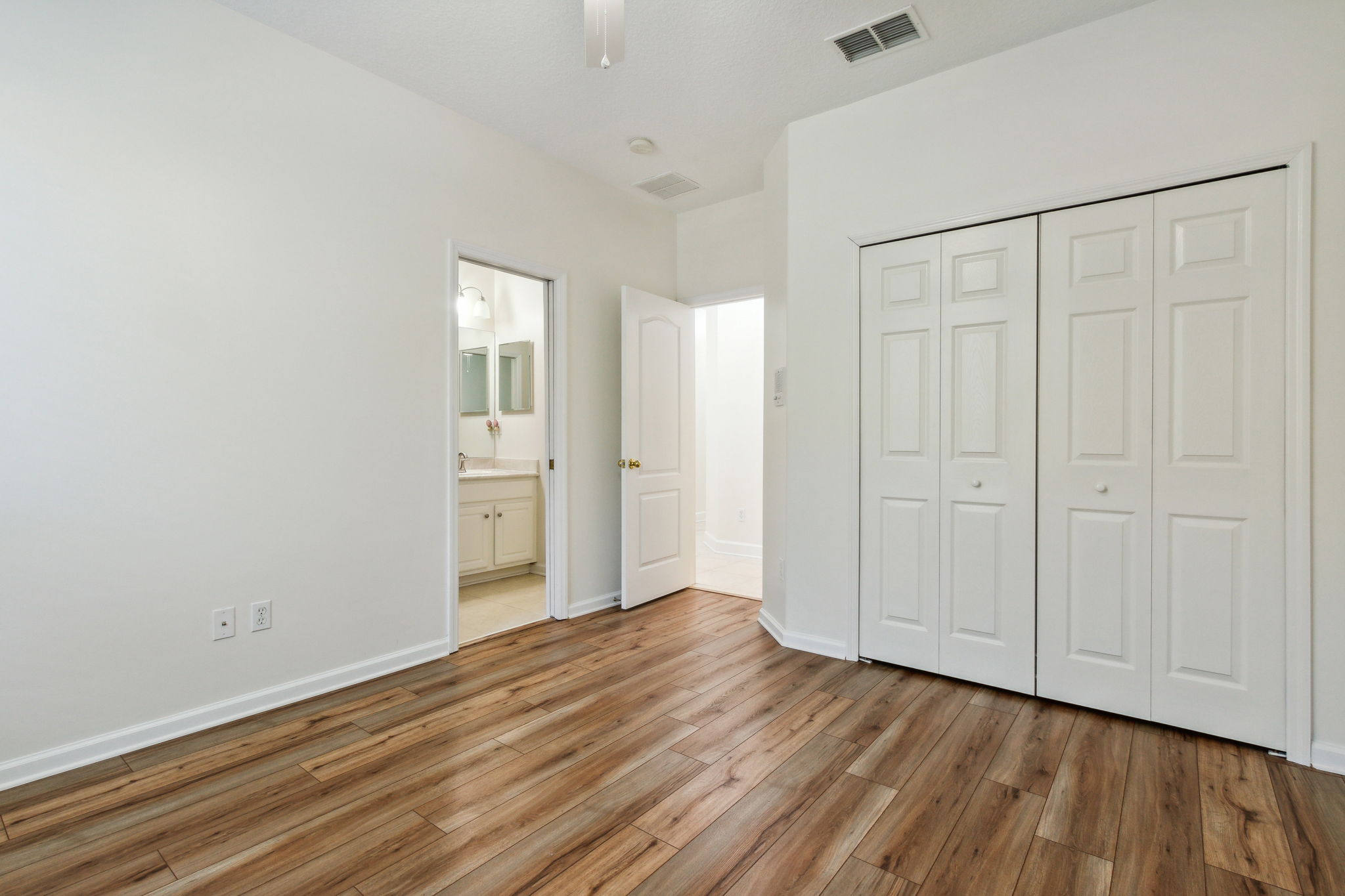2nd downstairs ensuite bedroom. Bathroom has a shower/tub combination and a new toilet