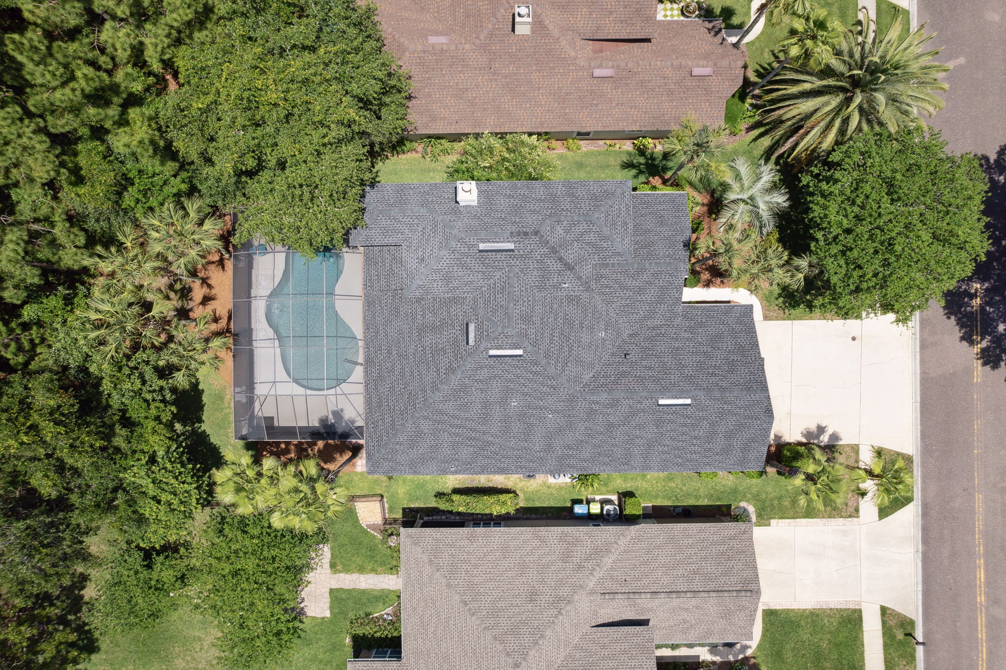 Aerial view of property. Roof replaced in 2023.