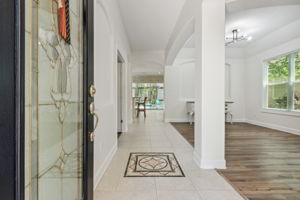 Entrance Foyer with Expansive Dining Area to the right