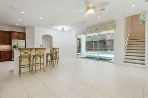 Breakfast bar/Eat-in kitchen with direct access to the pool/patio.