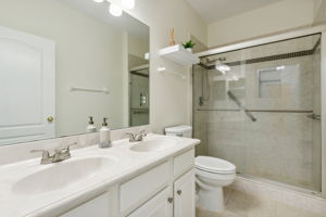 3rd bath with dual sinks and new toilet.