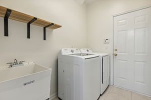 Laundry area with sink.