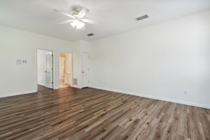 Upstairs gathering area with adjacent 4th bedroom and 4th bathroom.