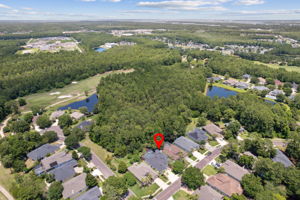 Aerial view of home located near the front of the neighborhood