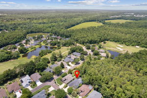 Aerial view of home located near the front of the neighborhood