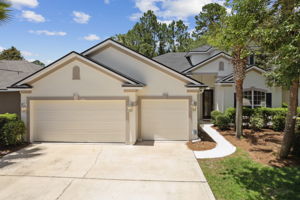 Three Car Garage with additional driveway parking