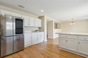 Throughout the first level is new flooring ...