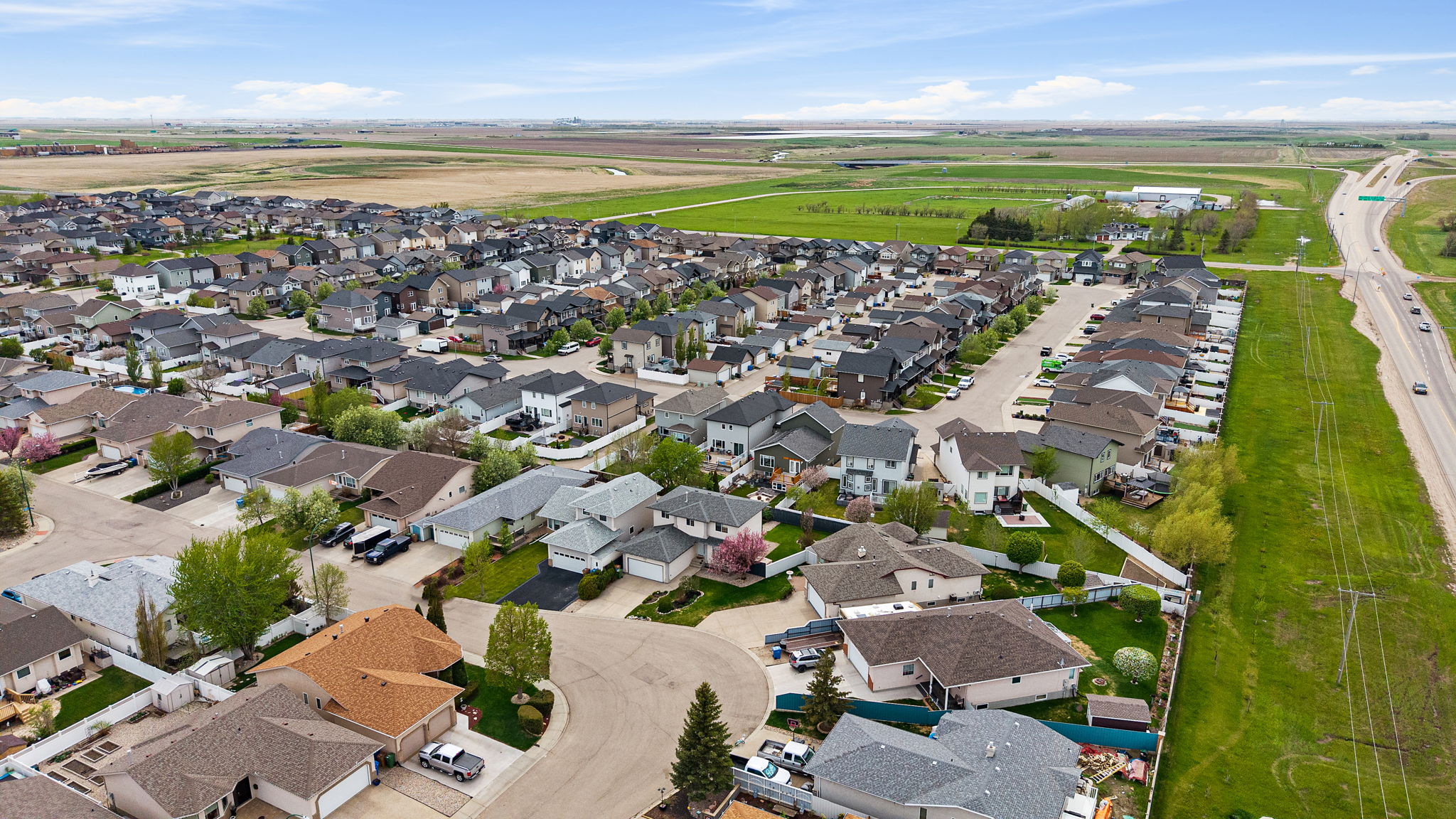 8628 Thurston Cres - 39. Drone - Front Side